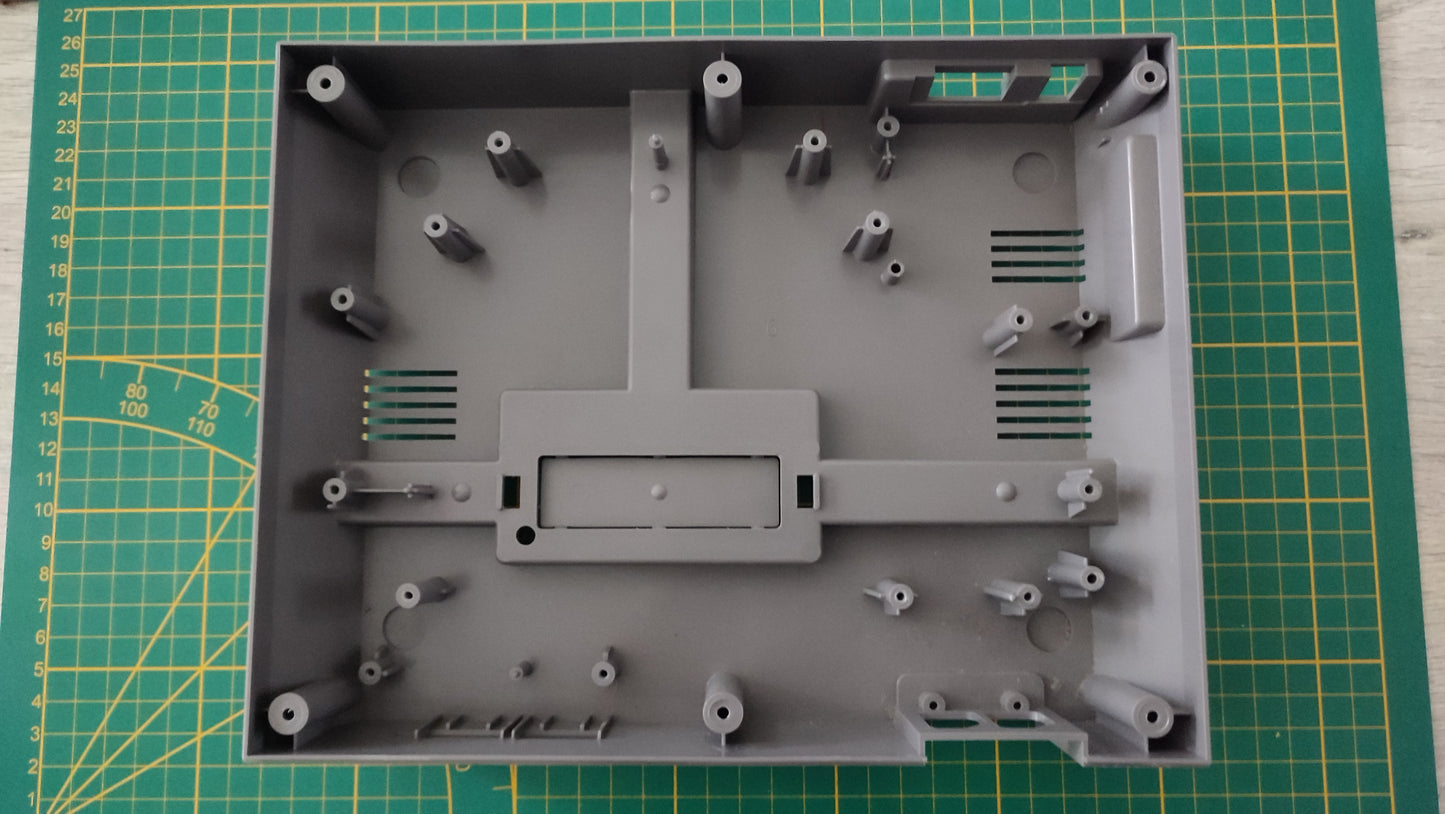 Plasturgie inférieure PE1221574 pièce détachée console de jeux Nintendo Nes NESE-001 FRA #D65