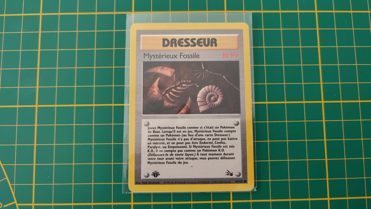 62/62 Carte Pokémon Dresseur Mystérieux Fossile 62/62 commune 1ère édition fossile Wizards #A73