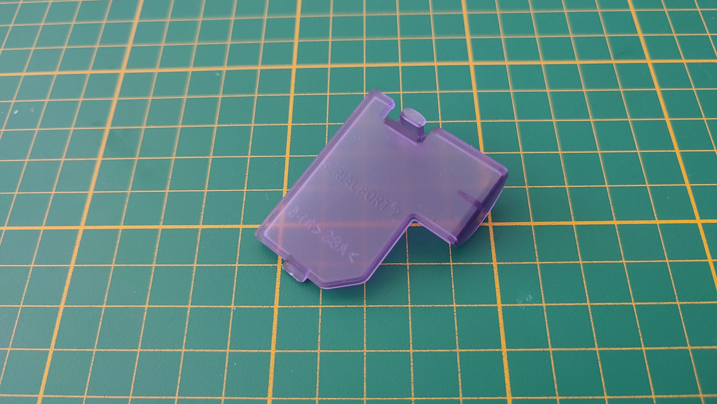 Cache serial port 2 seul violet transparent pièce détachée pour console de jeux Nintendo Game cube Gamecube DOL-101 et ou DOL-001