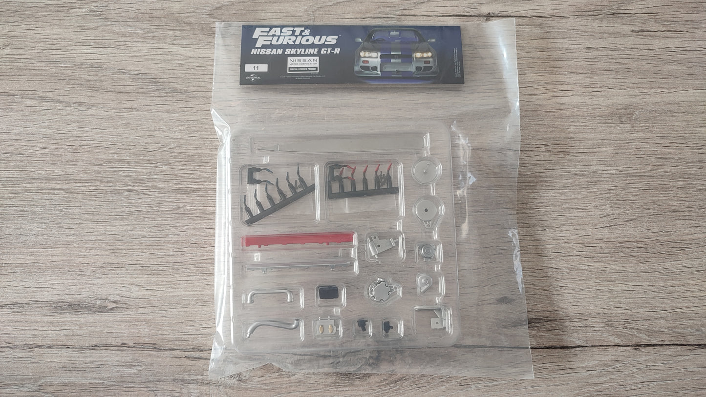 Lot pièces du fascicule numéro 11 n°11 pièce détachée Nissan Skyline GT-R R34 Fast & Furious de Brian O'Conner 1/8 1/8e 1/8ème Altaya #D82