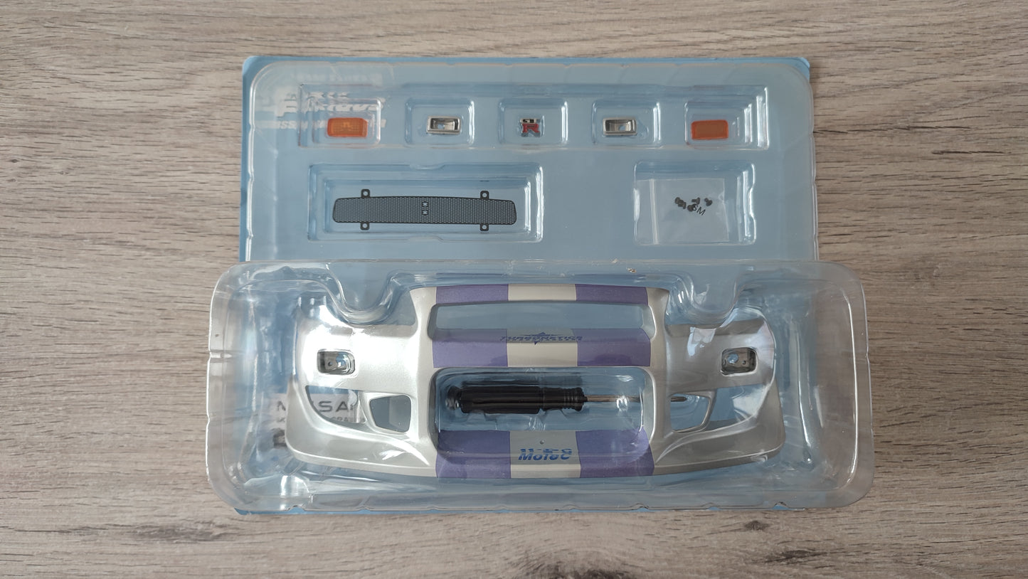 Lot pièces du fascicule numéro 1 n°1 pièce détachée Nissan Skyline GT-R R34 Fast & Furious de Brian O'Conner 1/8 1/8e 1/8ème Altaya #D82