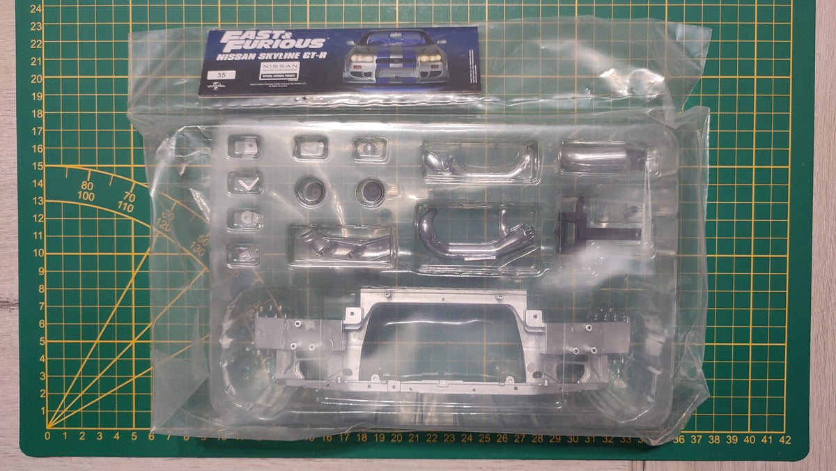 Lot pièces du fascicule numéro 35 n°35 pièce détachée Nissan Skyline GT-R R34 Fast & Furious de Brian O'Conner 1/8 1/8e 1/8ème Altaya #E78