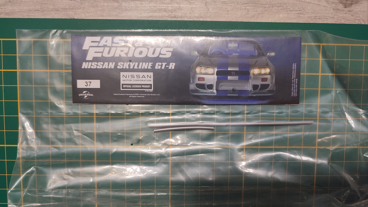 Lot pièces du fascicule numéro 37 n°37 pièce détachée Nissan Skyline GT-R R34 Fast & Furious de Brian O'Conner 1/8 1/8e 1/8ème Altaya #E78